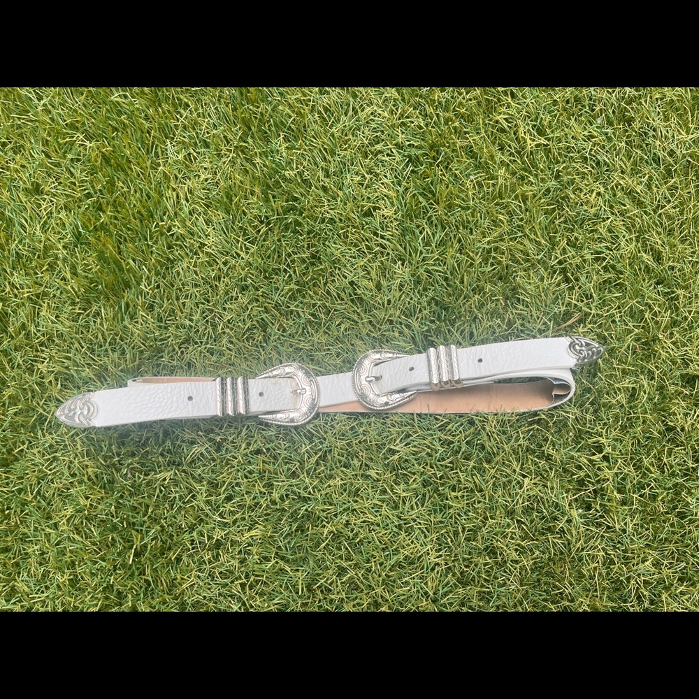 Double buckle white belt